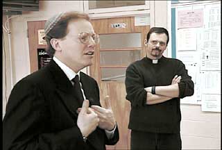 Rabbi and Priest teach in Catholic-Jewish educational program. 